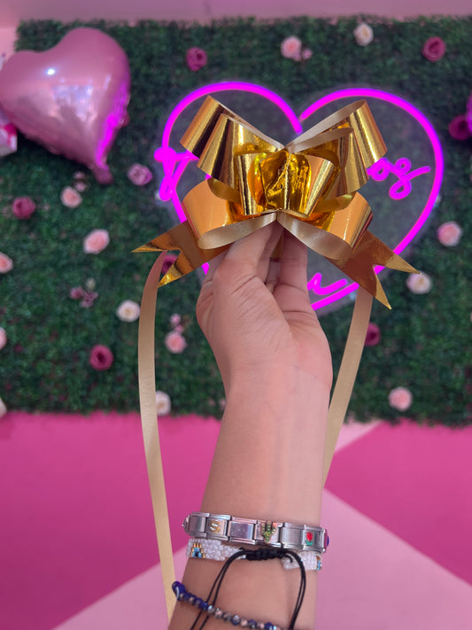 Moño dorado metalico para regalo